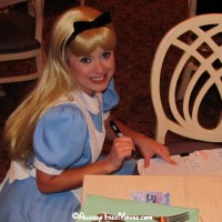 Alice signing the pillowcase