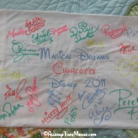 Disney autographs on a pillow case