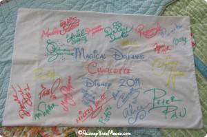 Disney autographs on a pillow case
