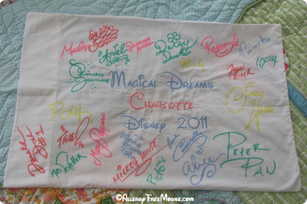 Disney autographs on a pillow case