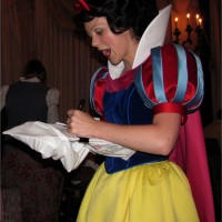 Snow White signing the pillowcase